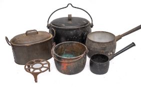 An iron oval cooking pot and cover: with iron swing handle by A.