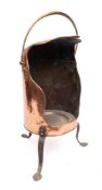 An early 19th Century copper plate warmer: with domed canopy and brass swing handle,