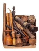 A collection of treen: including various egg cups, small roller, thermometer in wood holder,