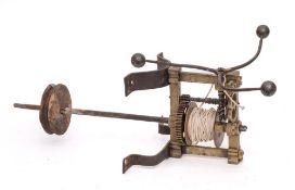 A rare 17th Century brass and iron English spit engine: with three branch governor wheel,