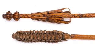 Two turned wood flax holding distaffs:, one with wrigglework decoration and cone-shaped end,