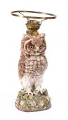 A porcelain owl lamp: of large size (probably Whitmann & Roth),