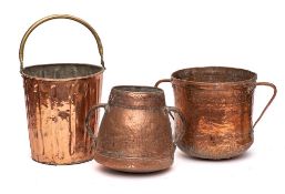 A copper and tinned cone-shaped bucket: with brass loop carrying handle,