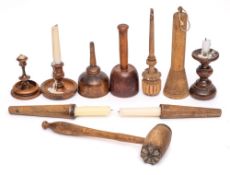 Five wooden candlesticks: of various designs, two wood mallets, wood funnel, a roller,