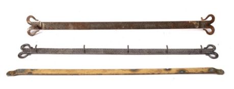 A steel bar type hook rack: with scroll ends and damascened decoration, having five hooks, 87.