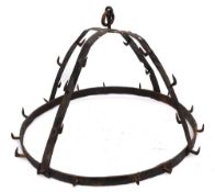 An 18th Century English iron 'Dutch Crown': with numerous hooks and rope attached, 66 cm diameter.