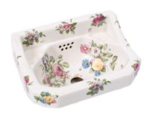 A French pottery wash basin:, printed decoration with sprays of flowers and foliage, 36 x 26cm.
