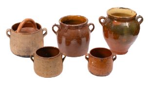 Five French pottery comfit jars: and a small jar with overhead handle.