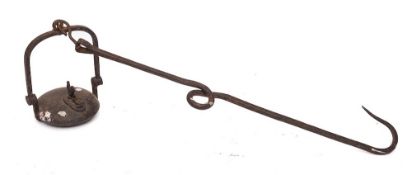 A French iron hanging oil lamp:, the circular font surmounted by a cockerel on a scrolled hook,