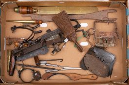 A miscellaneous collection of bygones: to include a gin trap, brass slice with wood handle,