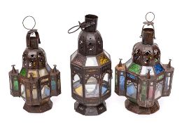 A Continental sheet metal octagonal pendant lantern: with pierced domed surmount and glazed Gothic