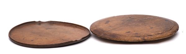 A circular fruitwood tray:, 41cm diameter,