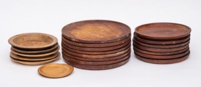 Eight turned wood dinner plates:, 29.