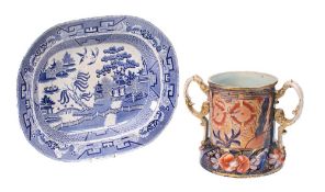An ironstone loving cup: of capstan form, decorated in a Japan pattern, 21cm high,