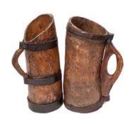 Two Pyrenean Cresse belle iron coopered jugs or scoops:, 40cm and 42cm high.