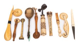 Three bone and treen pastry jiggers:, a bone apple corer inscribed Anne Bates 1876 A.D.