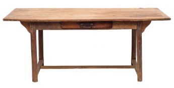 A 19th Century Continental birch dining table: of refectory type,