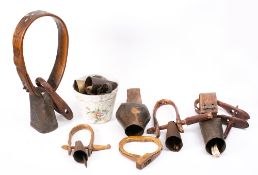 A collection of five Pyrenean bells: with wood hand holds,