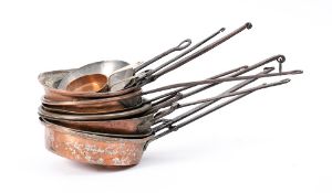 Eight various copper and tinned saucepans: with iron handles, also three small copper,