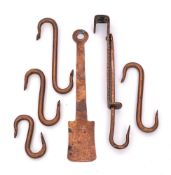 A copper two-section adjustable meat hook:, four copper meat hooks and a copper slice.