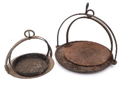 Three wrought iron circular hanging griddle plates or baking irons:, 40cm, 32.