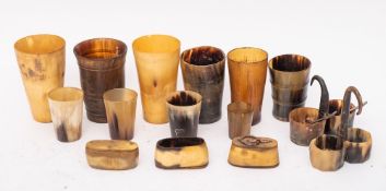Two horn two division cruets:, each with a central horn handle, an oval horn salt,