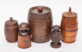 A treen two section spice barrel: with reeded bands and urn finial, 17cm high,