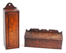 An early 19th Century oak candle box: with fret cut ledge back and sloping hinged top, 32.