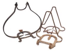 Three hanging grid irons: of horseshoe outline.