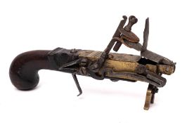 An 18th Century brass and steel mounted tinder pistol: with wood stock,