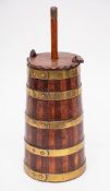 A brass bound table butter churn: of tapered form with cover and plunger, 28.5cm high.
