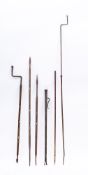 Two hand driven metal spits: and four others.