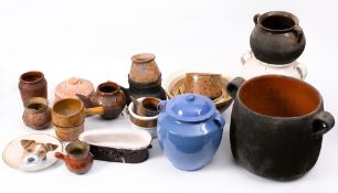 A French terracotta twin-handled jar: with brown glazed interior, 25cm high,