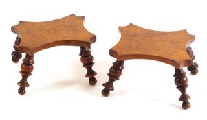 A pair of 19th Century yew-wood stands: in the form of small stools,