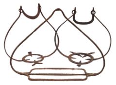 An iron hanging apple cooker: with twin divisions,