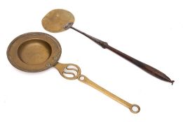 A 19th Century brass circular hanging pan: with thread border and pierced work handle,