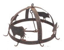 A 19th Century iron banded 'Dutch Crown': with decoration of two cows and two pigs.