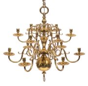 A brass twelve branch two tier graduated chandelier: in the early 18th Century Dutch taste,