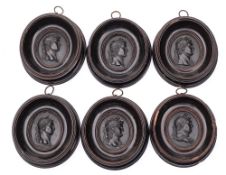 A set of six small Wedgwood black basalt oval portrait-reliefs of Roman Emperors from the twelve