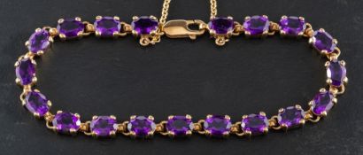 An oval, mixed-cut, amethyst bracelet,: estimated total amethyst weight ca.