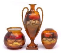 Three Royal Doulton vases: comprising a two handled pedestal vase of slender oviform painted with