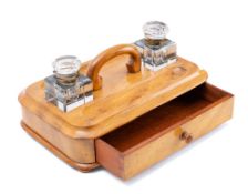 A late Victorian yew wood ink stand: of rectangular outline,