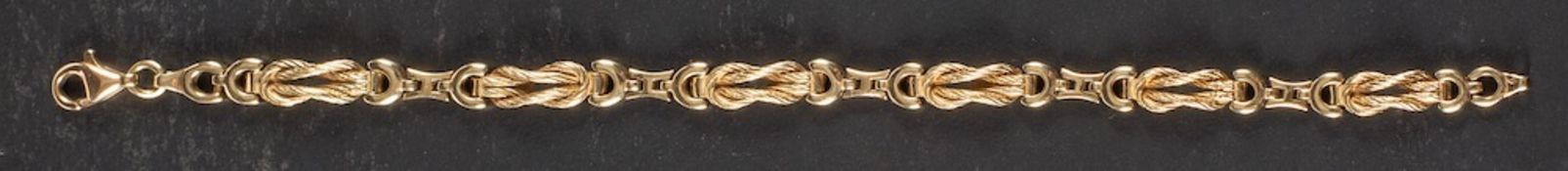 A 9ct gold, fancy-link bracelet,: import marks for London, length ca. 19cm, total weight ca. 11.