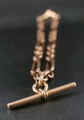 A figaro-link watch chain,: with T-bar and two dog clips, one of which is stamped '15ct',