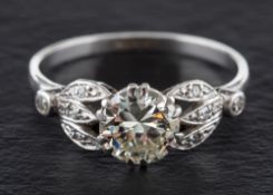 A round, brilliant and single-cut diamond ring,: estimated weight of principal diamond, ca.