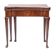 A George II mahogany combined tea and card table, mid 18th century,