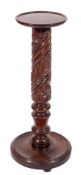 A Victorian mahogany vase or lamp stand, last quarter 19th century and possibly adapted,