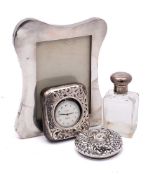 A mixed lot of silver wares, various makers and dates: includes a photograph frame,