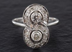 A round, brilliant and single-cut diamond ring in a figure of eight design,