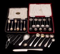 A mixed lot of silver flat wares, various makers and dates: includes sugar nips, tongs,